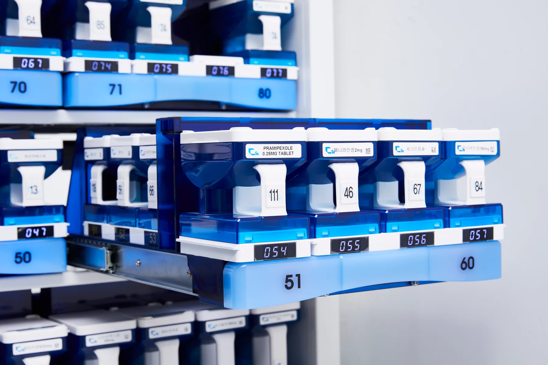 T-slide drawer extended with numbered drug cassettes