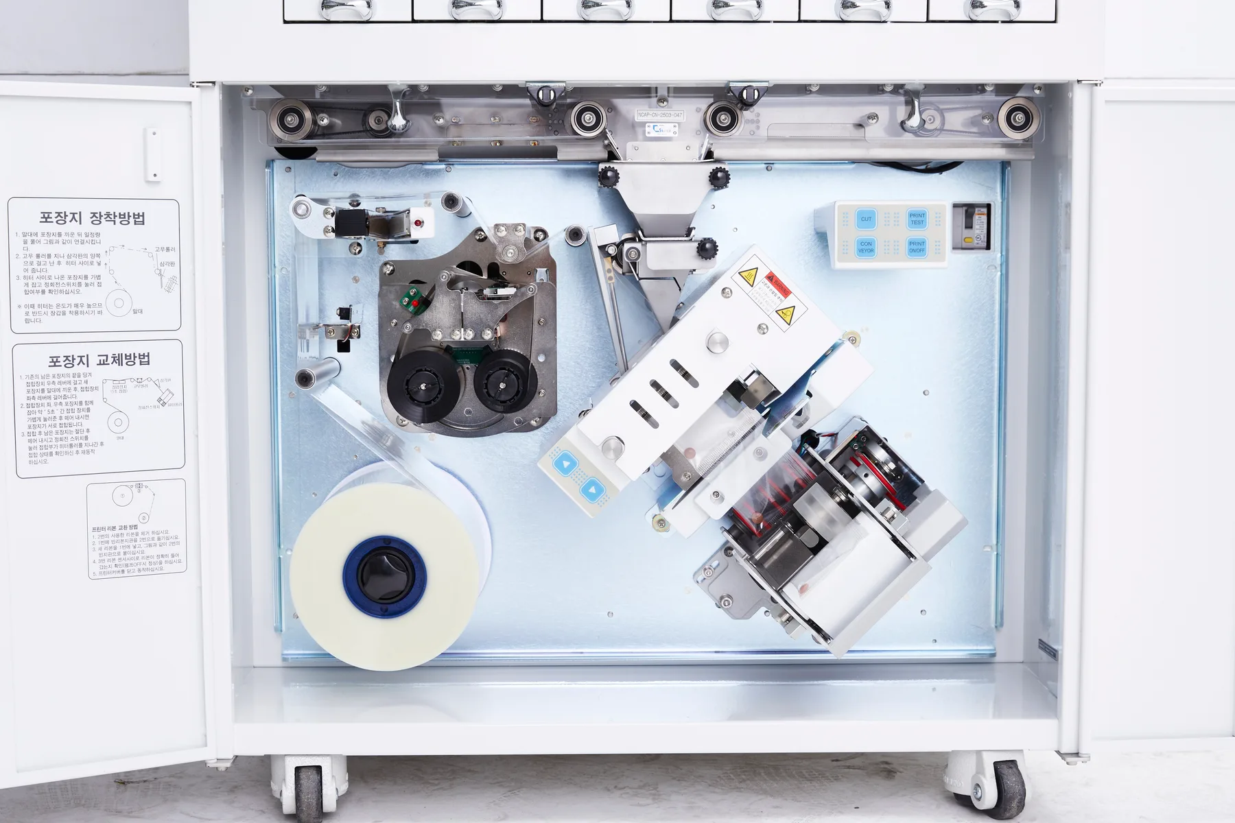 Printing and packing system inside the lower cabinet with wrapping paper roll
